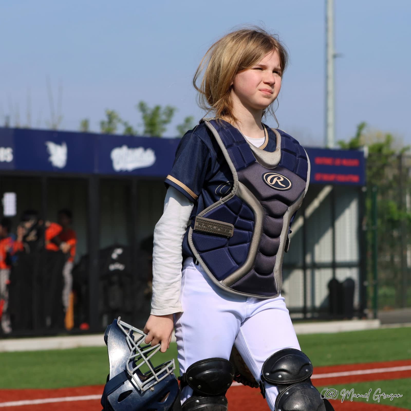 Receveuse des Wildcats en tenue de protection